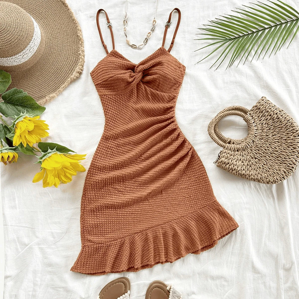 A pure and sexy halter dress that is tight and slimming, with ruffled