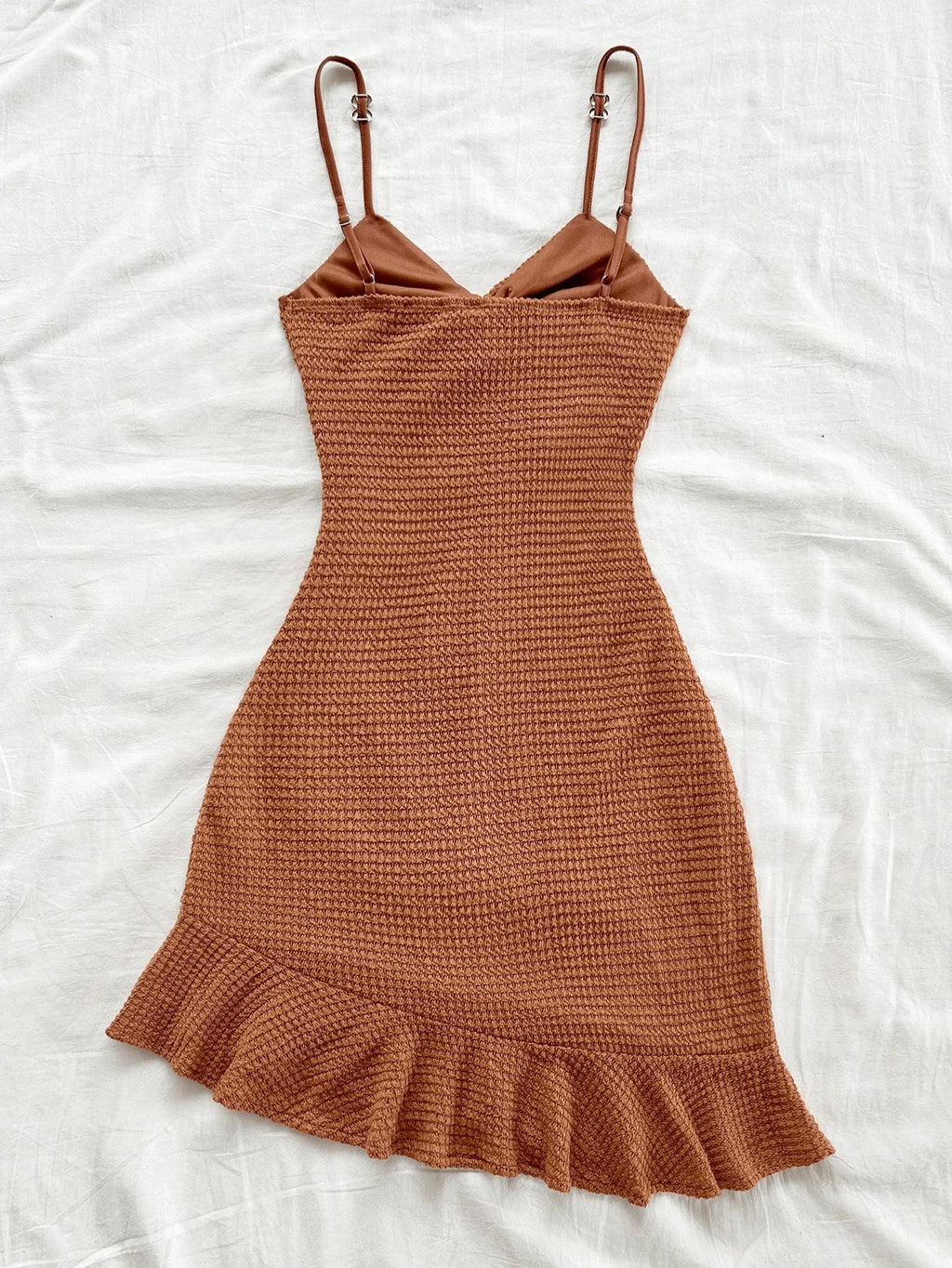 A pure and sexy halter dress that is tight and slimming, with ruffled