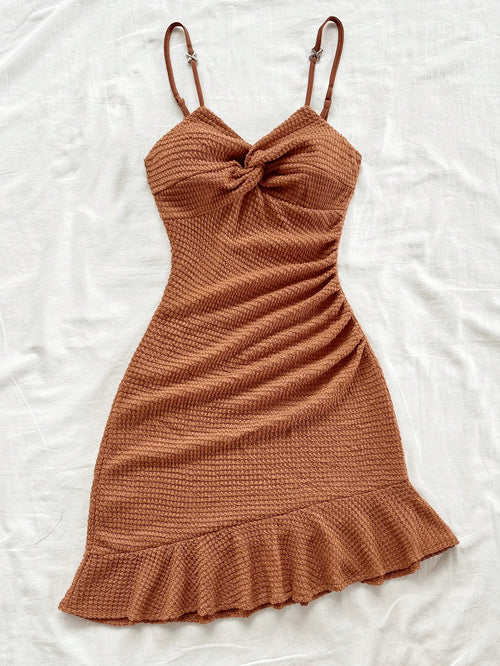 A pure and sexy halter dress that is tight and slimming, with ruffled